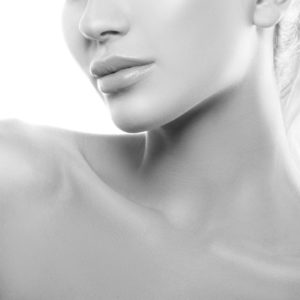 Beauty part of face and shoulder of young woman with perfect ski